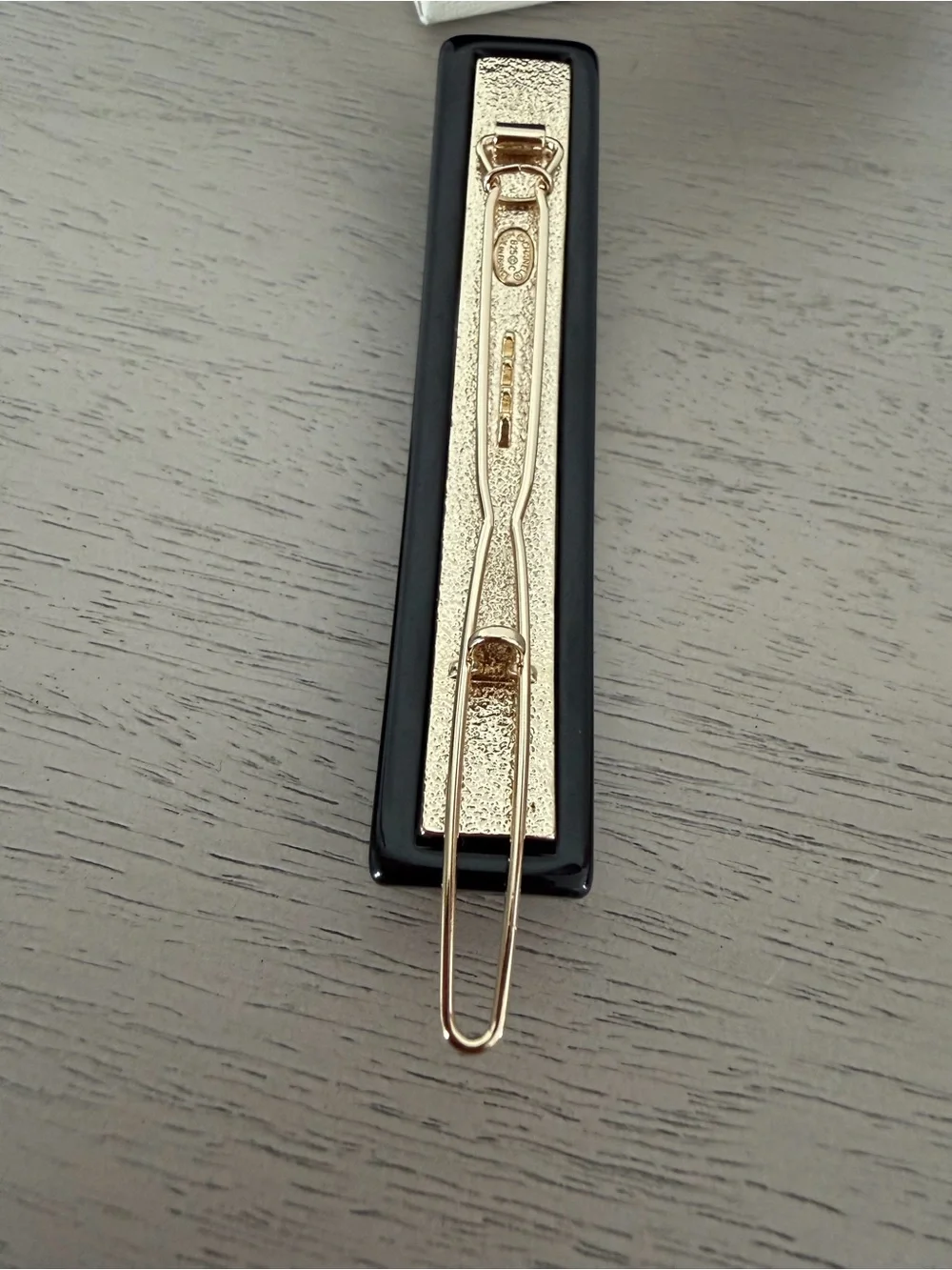CHANEL Black Resin Hair Clip with Gold Crystal CC Logo